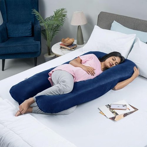 Comfortable pregnancy pillow offering full body support for pregnant women, reducing back, belly, and hip discomfort.